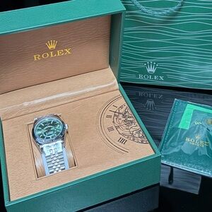 Swiss Watch with Silver Band and Green Dial